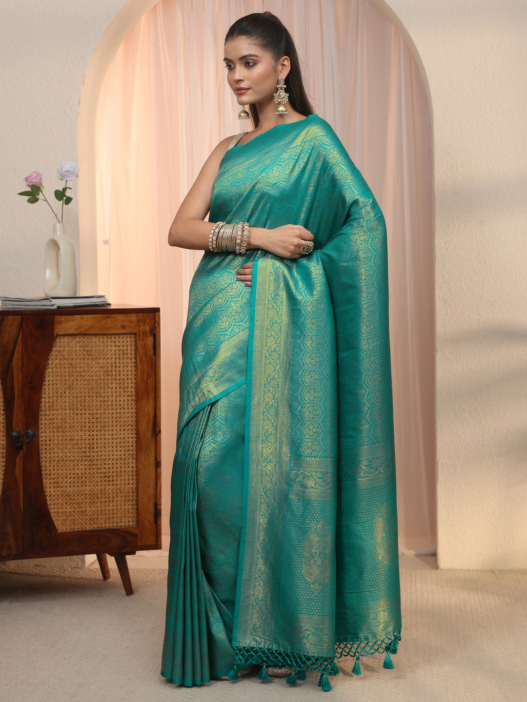 Libas Sea Green Woven Design Silk Blend Tassel Saree