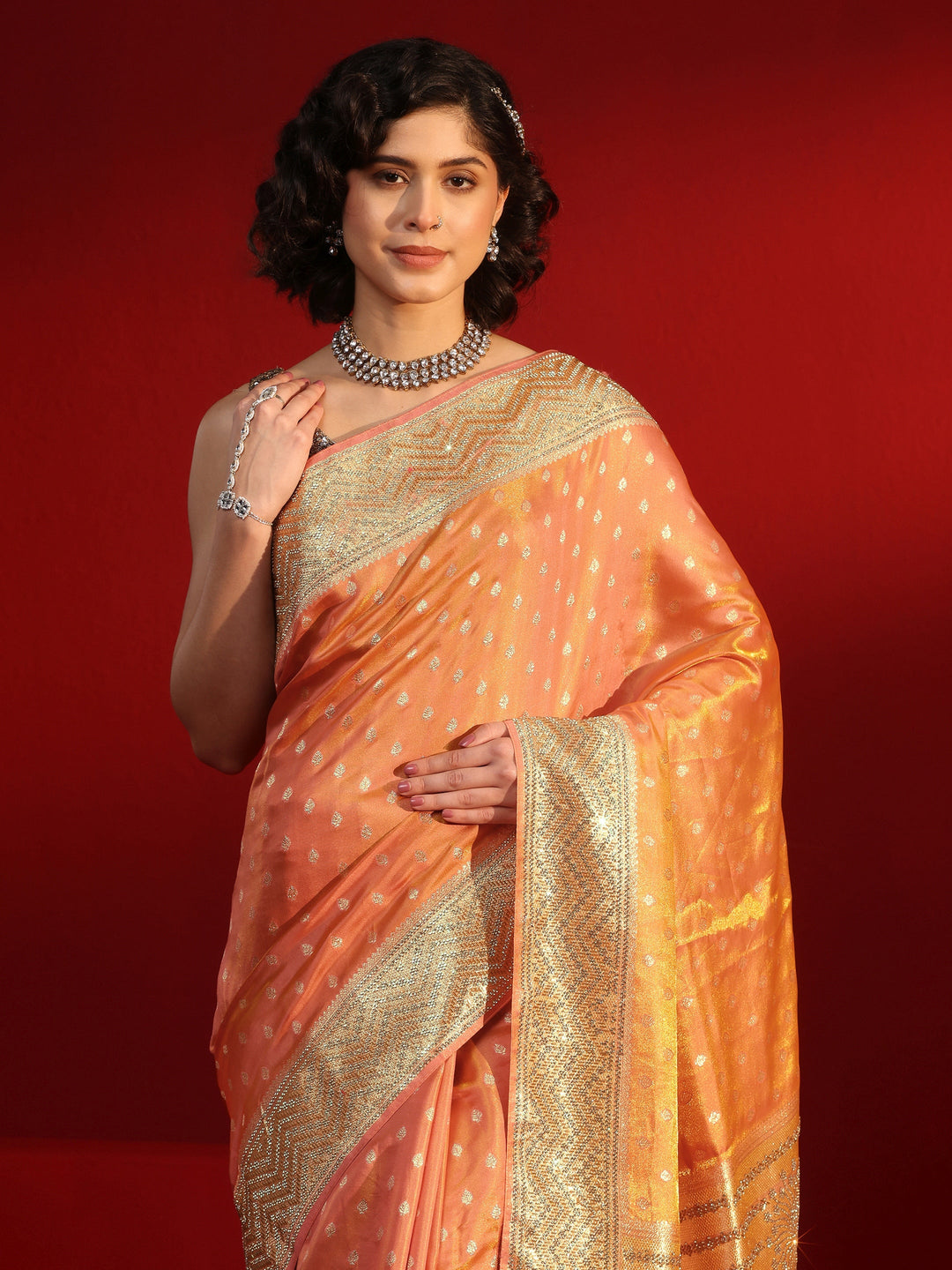 Libas Art Peach Woven Design Silk Blend Saree with Embellished Border