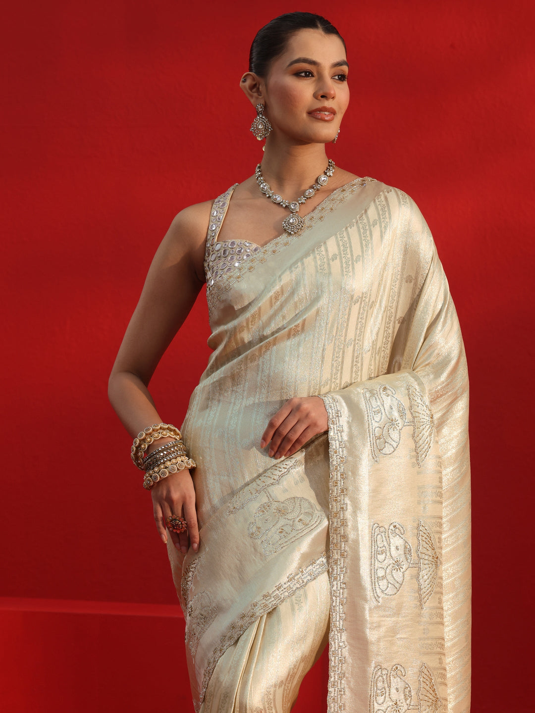 Libas Art Cream Woven Design Silk Blend Saree with Embellished Border