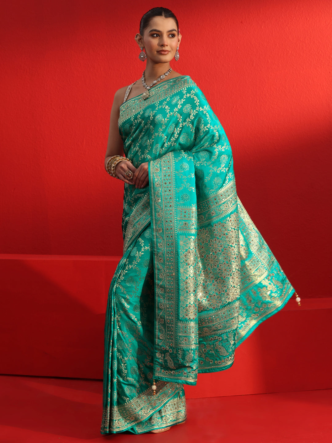 Libas Art Sea Green Woven Design Silk Blend Saree with Embellished Border