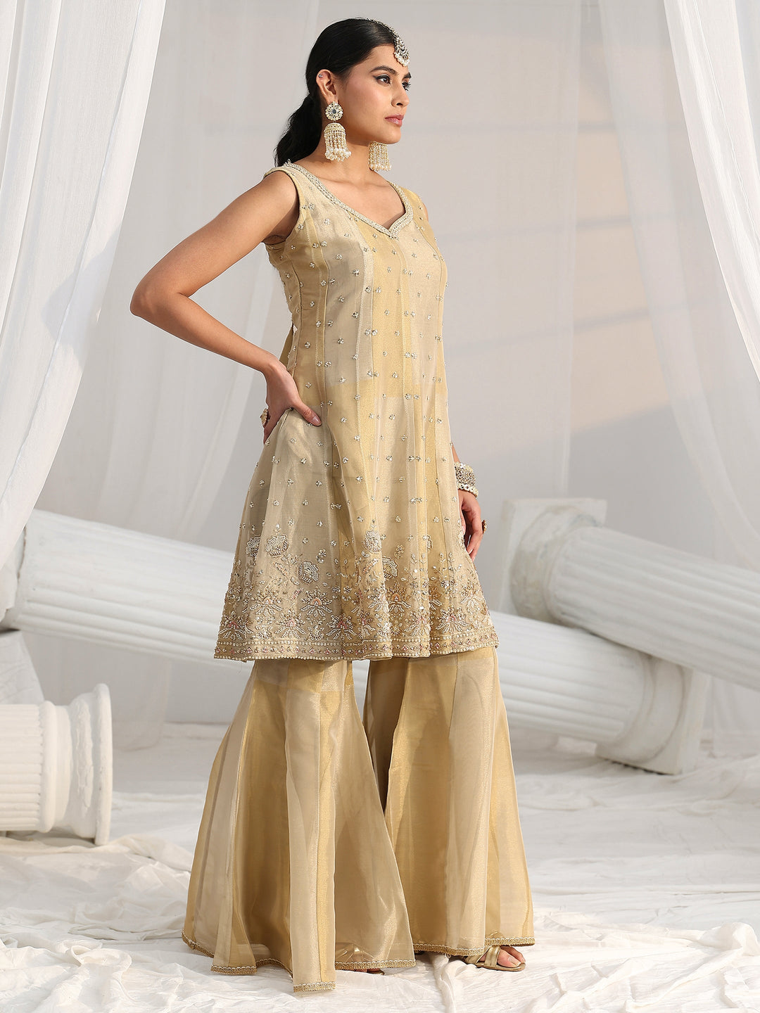 Libas Art Golden Floral Embellished Sleeveless Tissue Sharara Suit Set