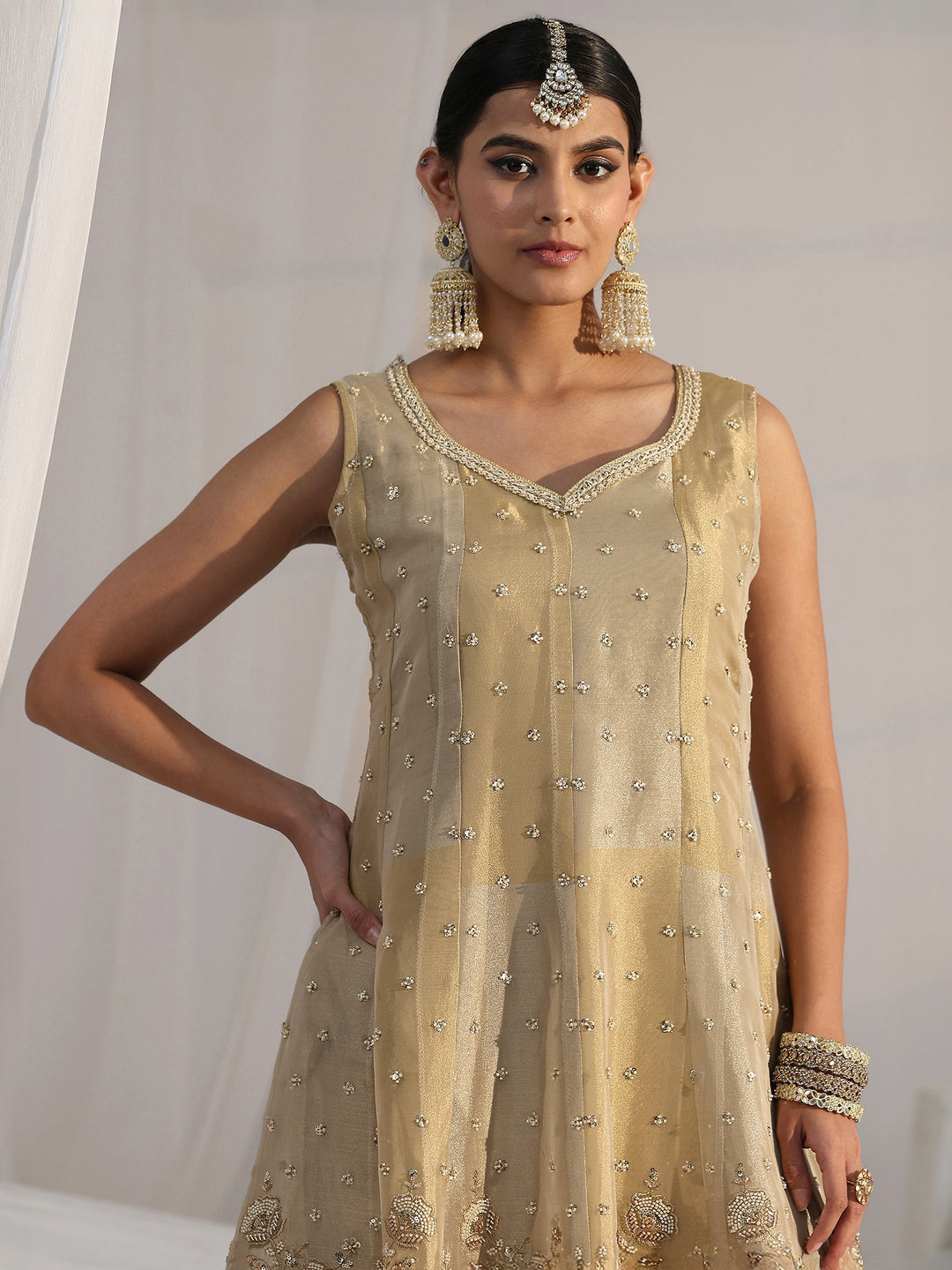 Libas Art Golden Floral Embellished Sleeveless Tissue Sharara Suit Set