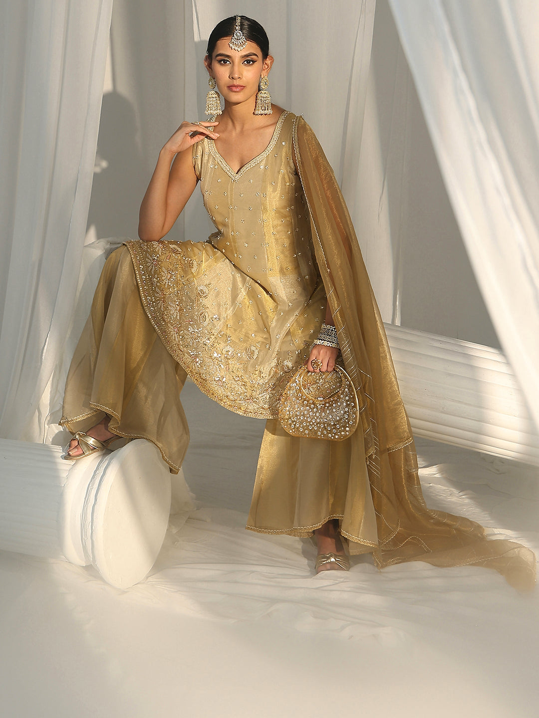 Libas Art Golden Floral Embellished Sleeveless Tissue Sharara Suit Set