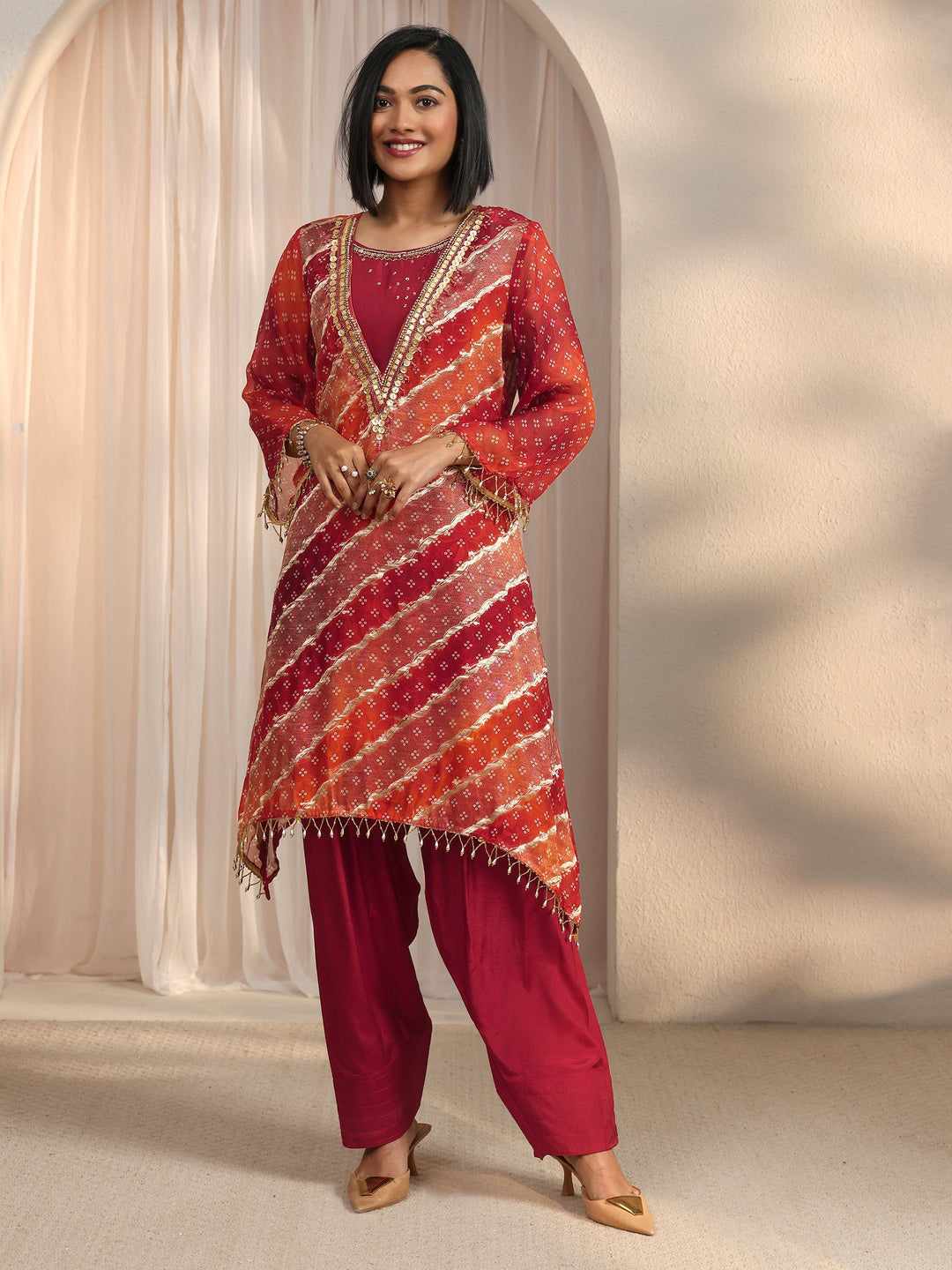 Libas Orange Bandhani Printed Organza Farshi Salwar Suit