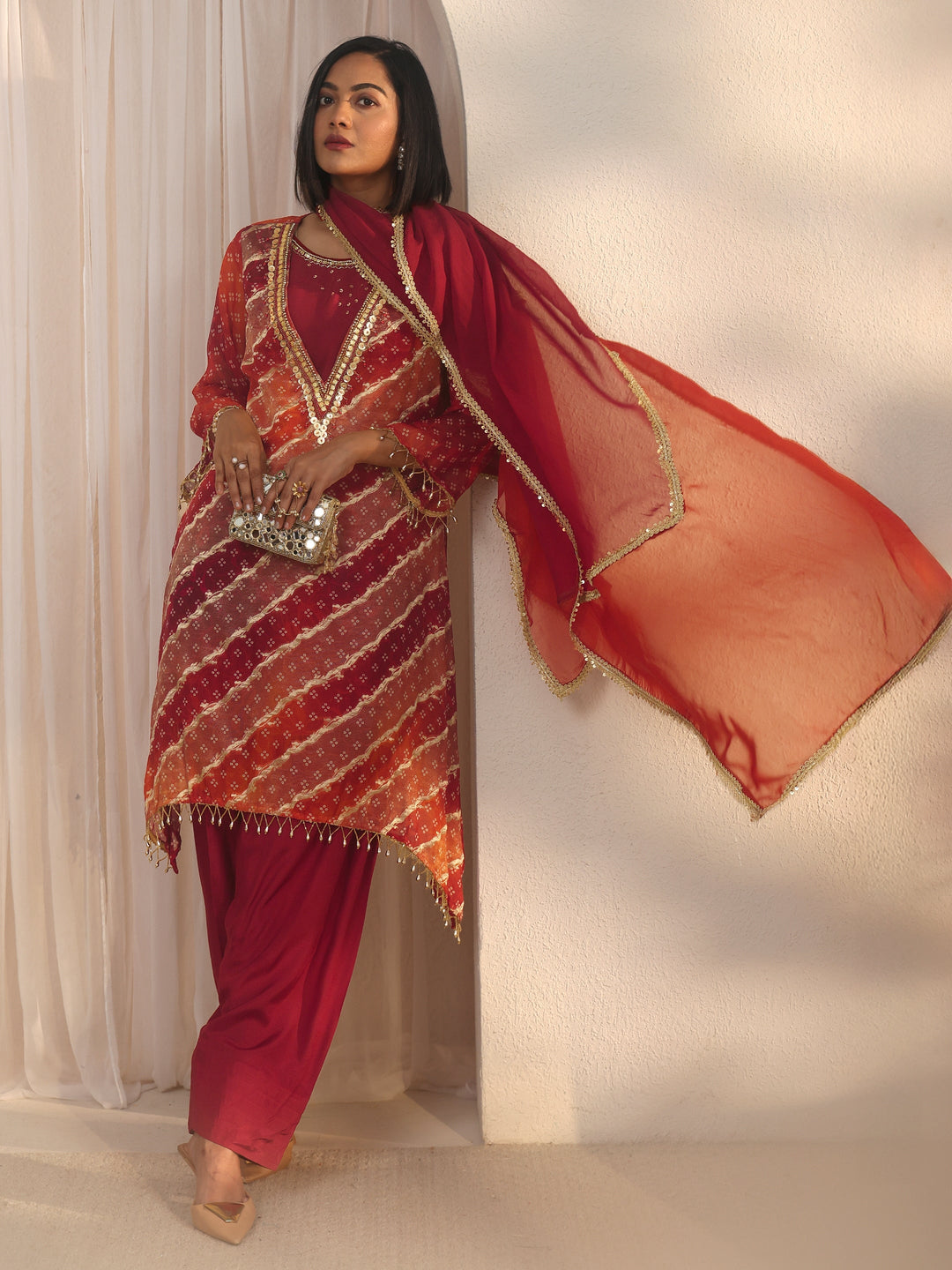 Libas Orange Bandhani Printed Organza Farshi Salwar Suit