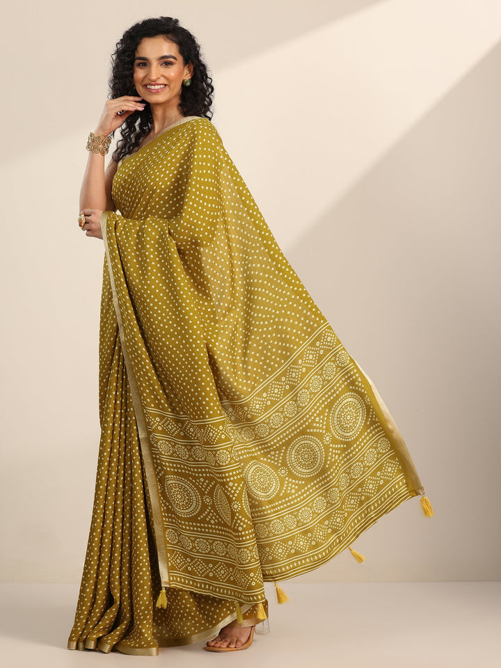 Mustard Printed Georgette Saree With Unstitched Blouse Piece