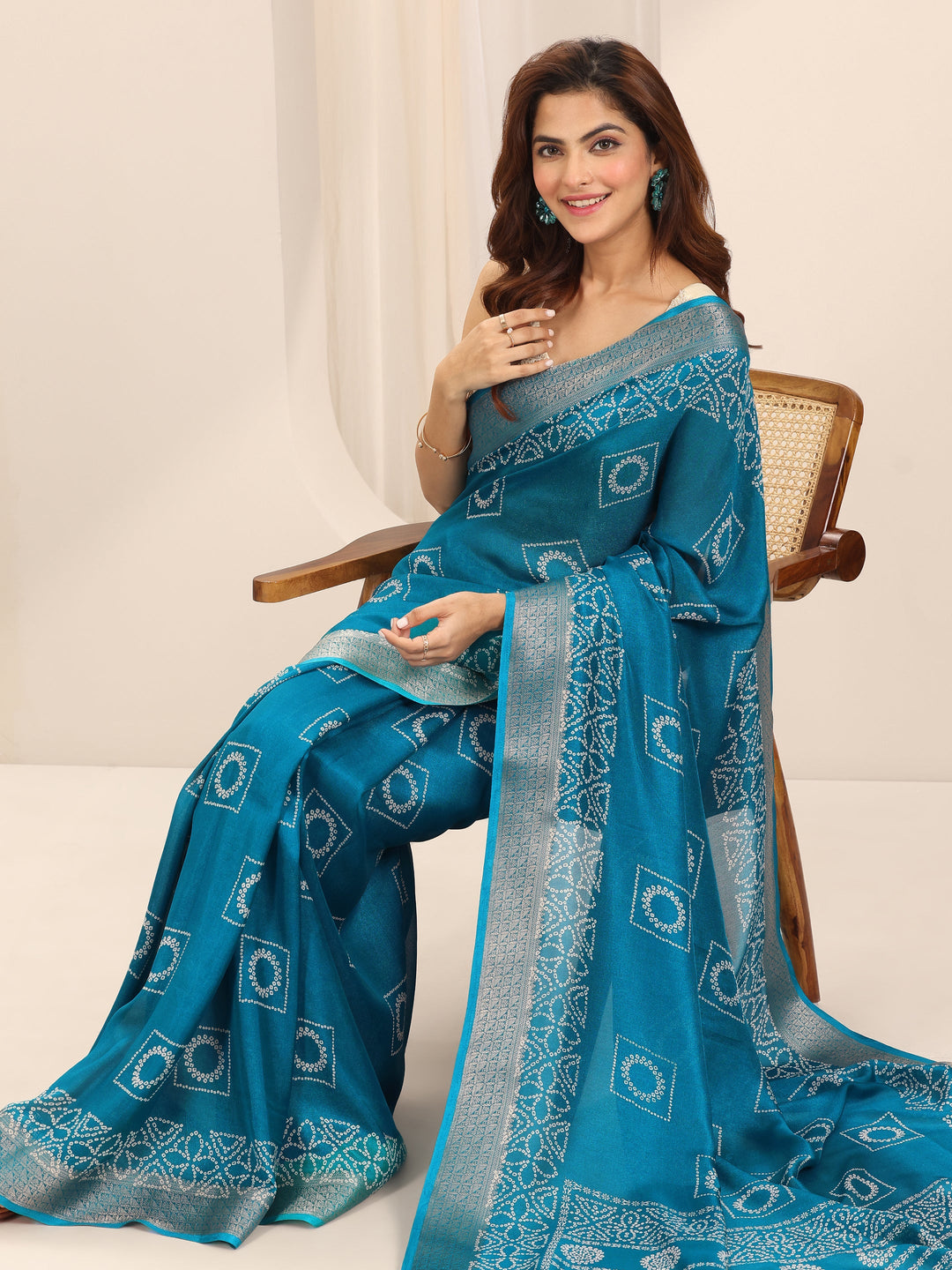 Teal Printed Georgette Saree With Unstitched Blouse Piece