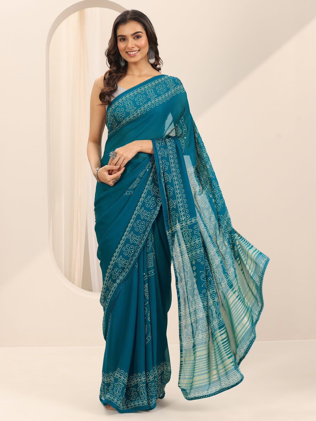 Teal Printed Georgette Saree With Unstitched Blouse Piece