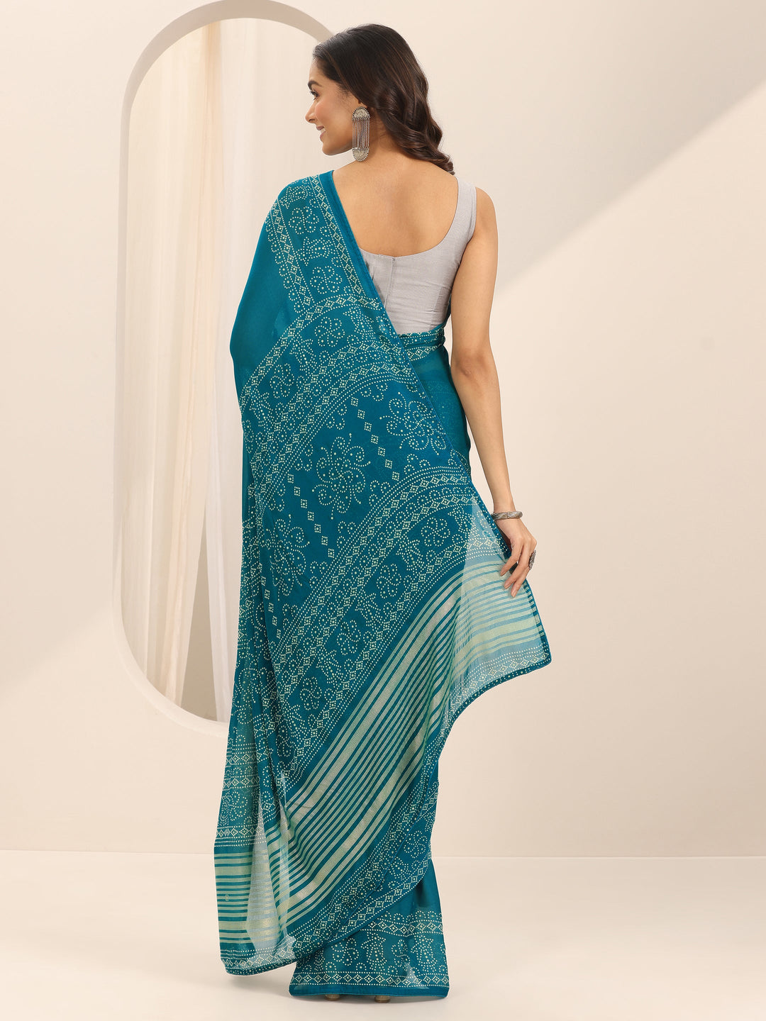 Teal Printed Georgette Saree With Unstitched Blouse Piece