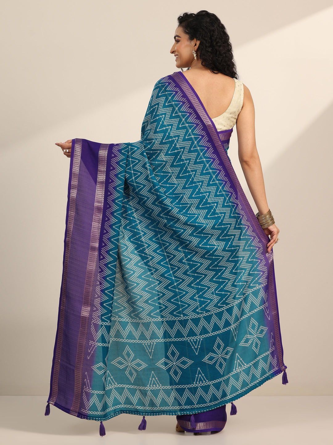 Teal Printed Georgette Saree With Unstitched Blouse Piece