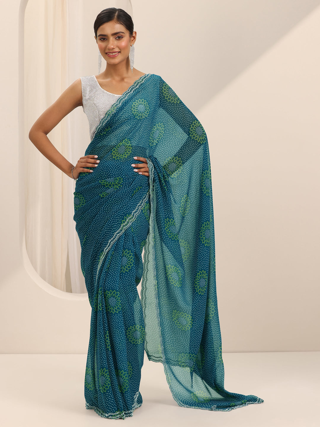 Teal Printed Georgette Saree With Unstitched Blouse Piece
