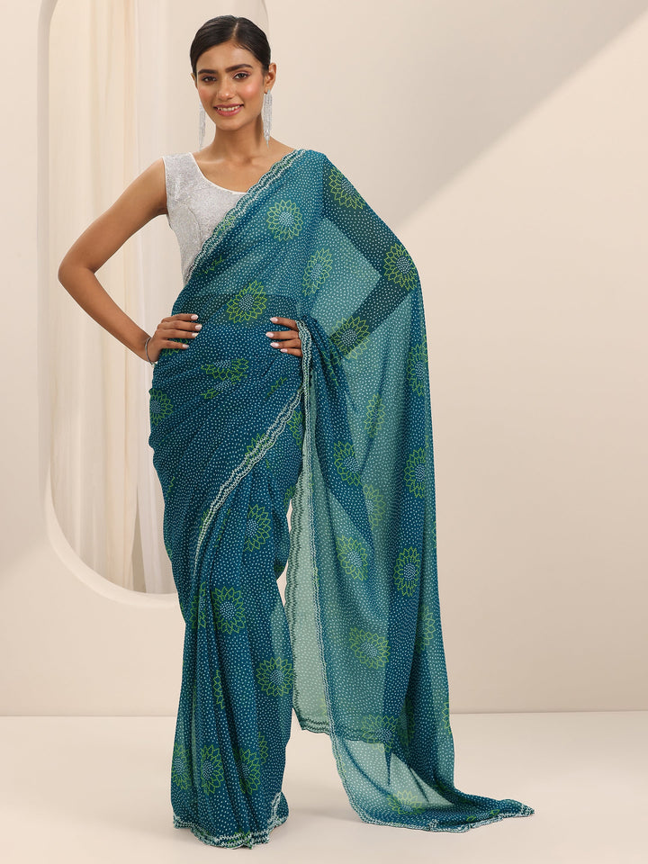 Teal Printed Georgette Saree With Unstitched Blouse Piece