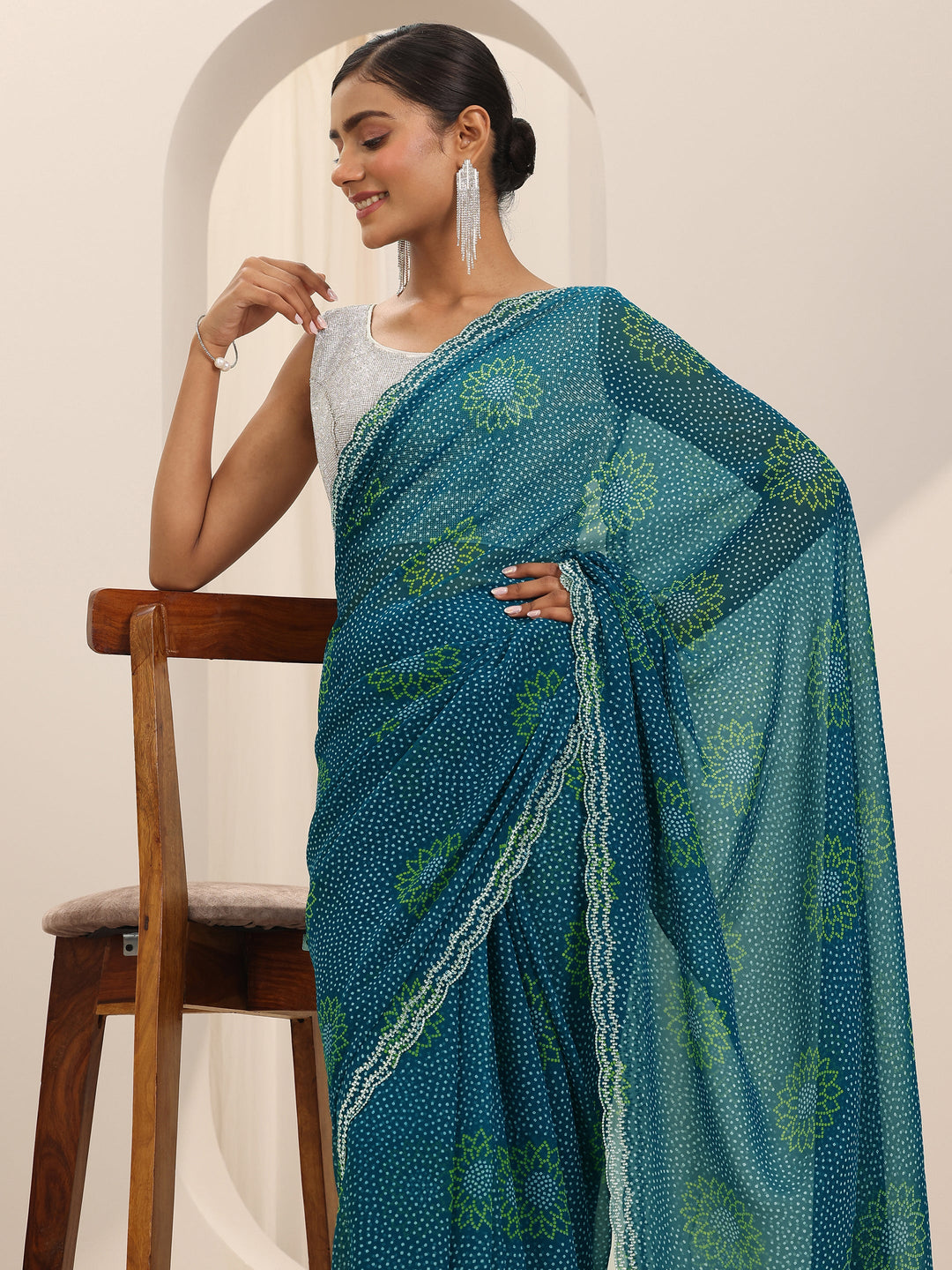 Teal Printed Georgette Saree With Unstitched Blouse Piece