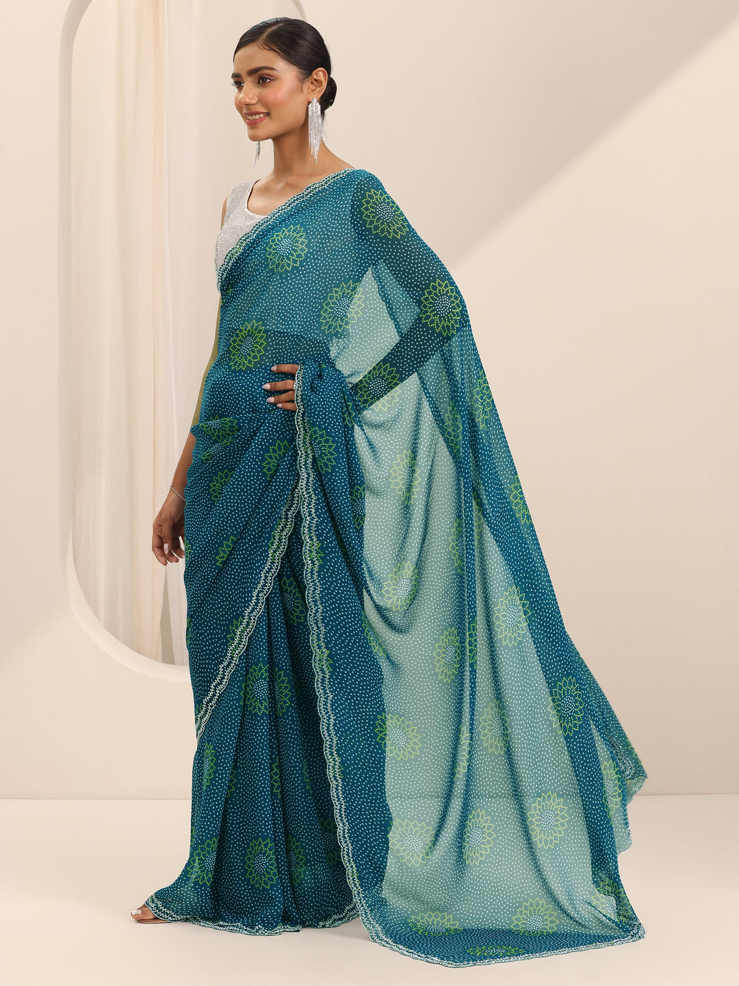 Teal Printed Georgette Saree With Unstitched Blouse Piece