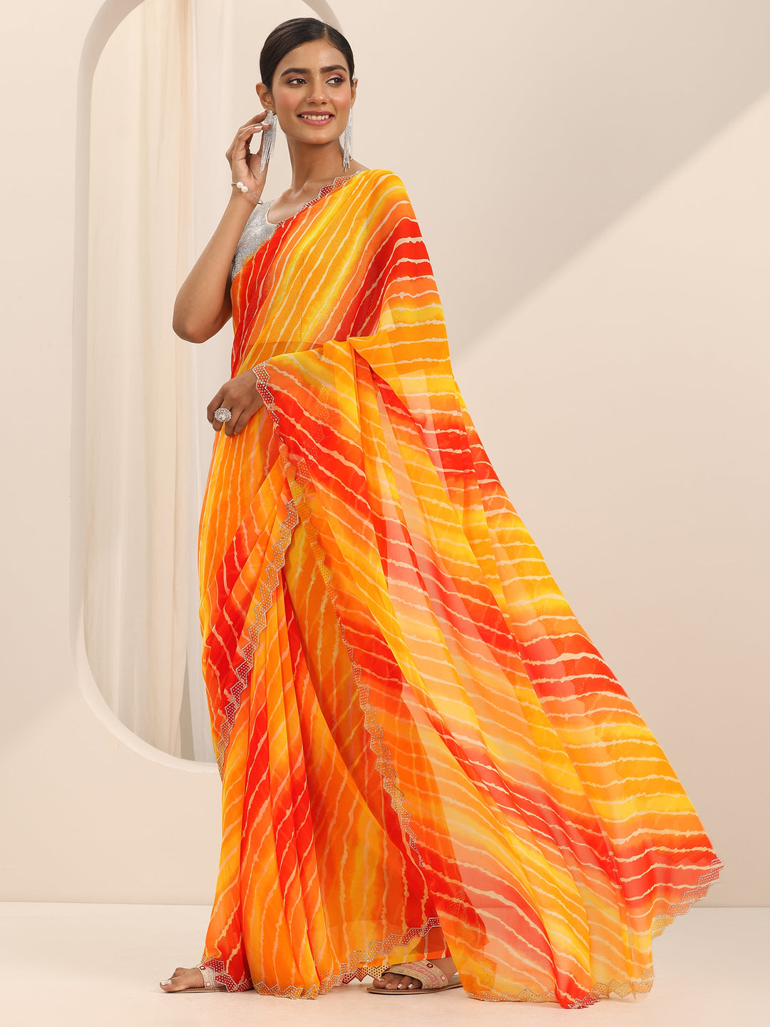 Mustard Printed Georgette Saree With Unstitched Blouse Piece