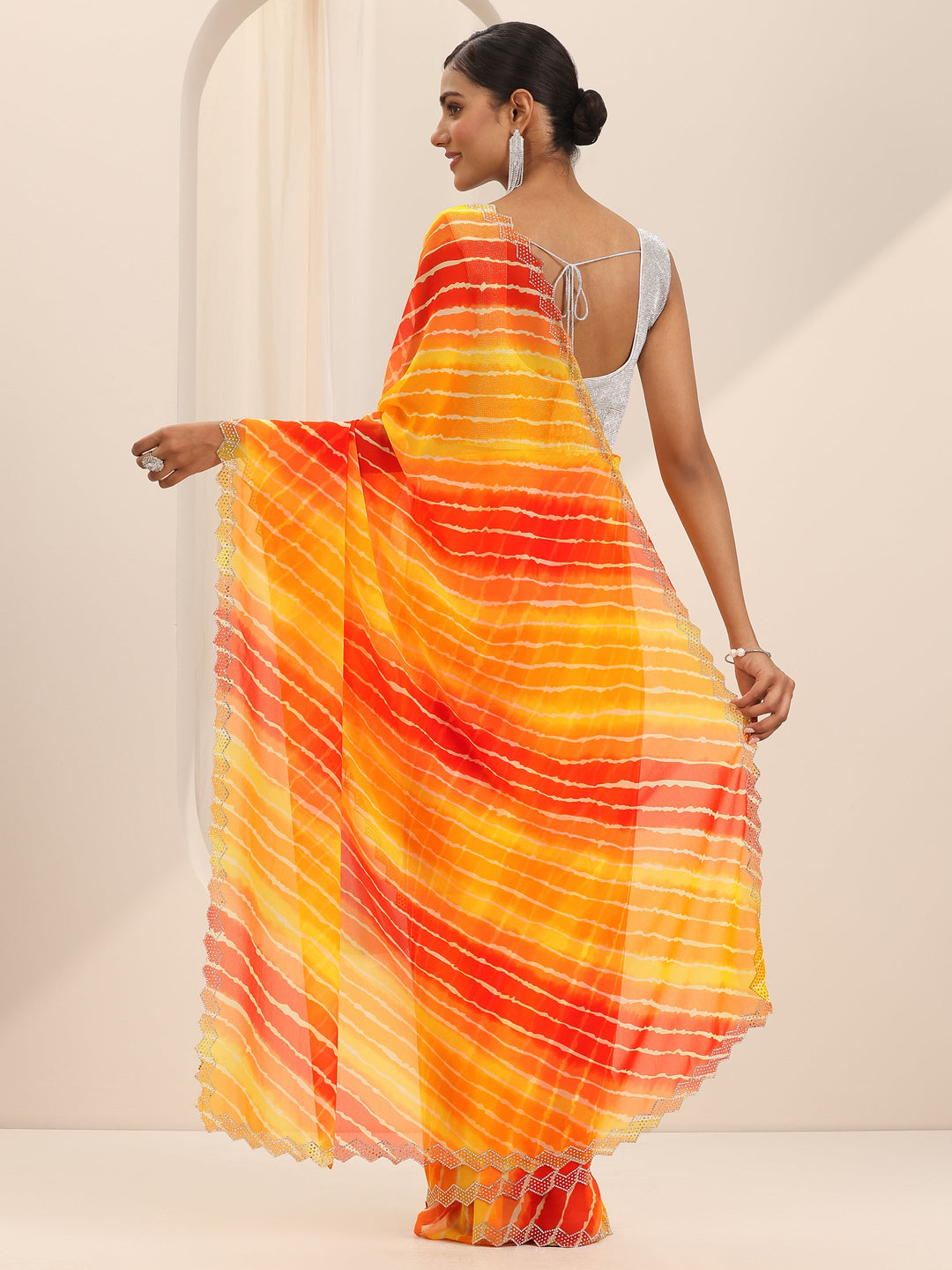 Mustard Printed Georgette Saree With Unstitched Blouse Piece