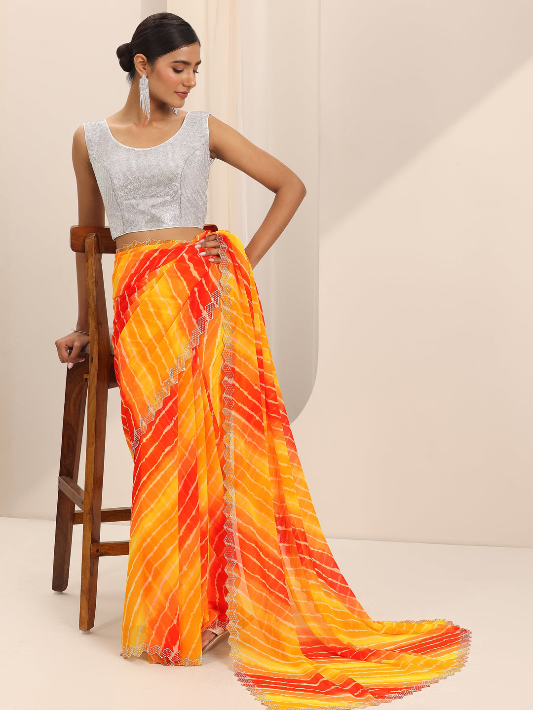 Mustard Printed Georgette Saree With Unstitched Blouse Piece