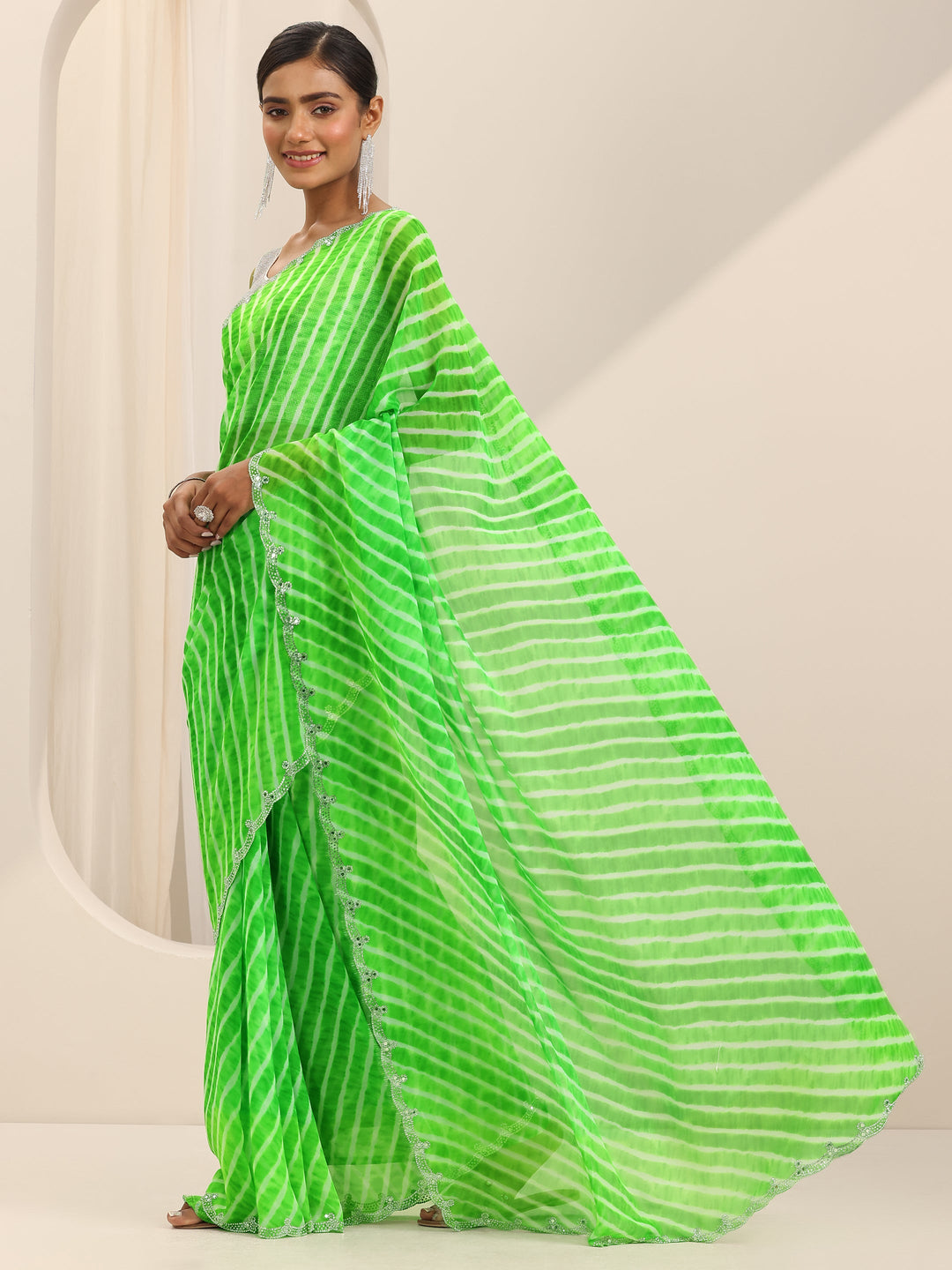 Green Printed Georgette Saree With Unstitched Blouse Piece