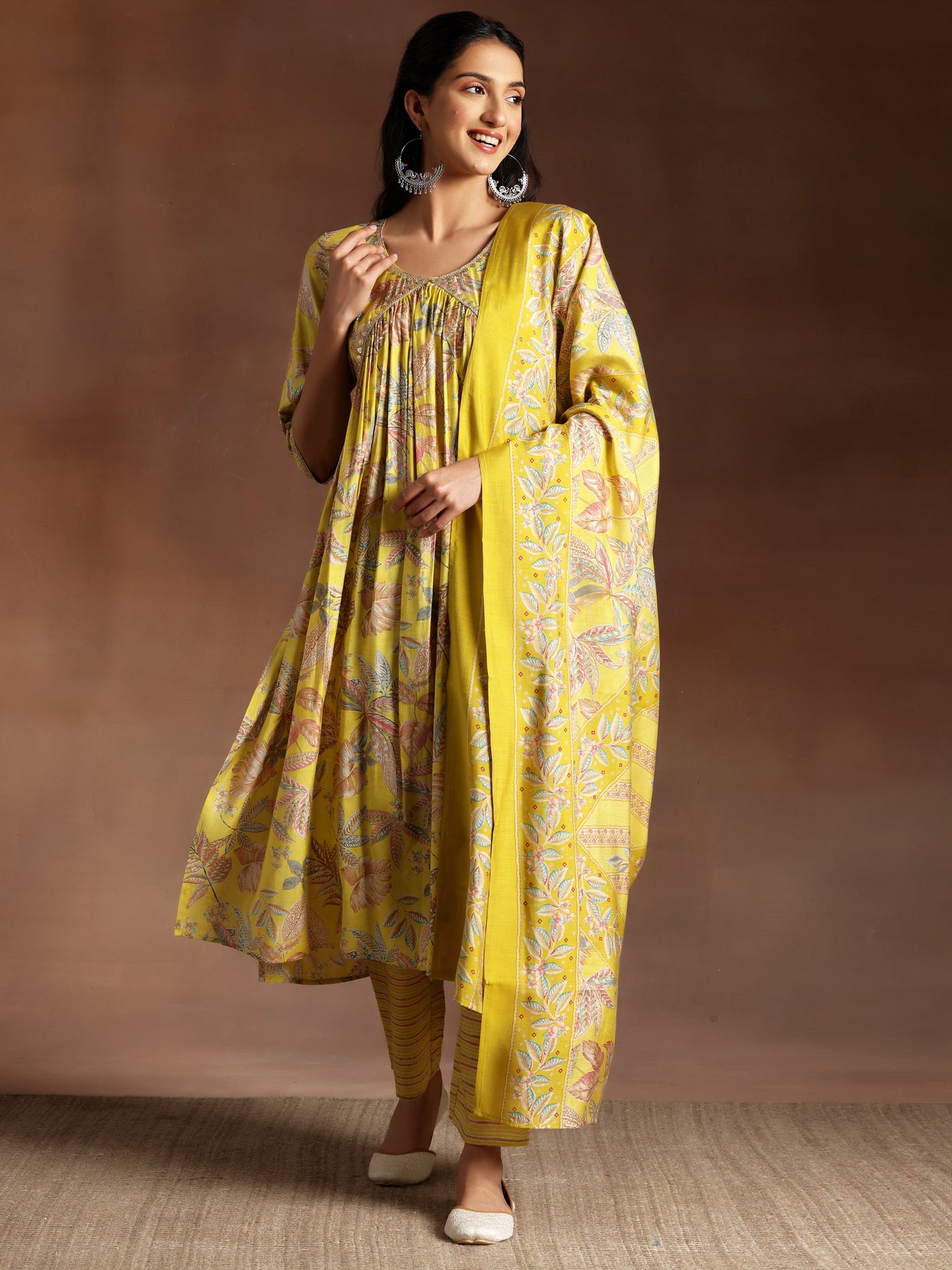 Aashna Mustard Printed Silk Blend A-Line Kurta With Palazzos & Dupatta