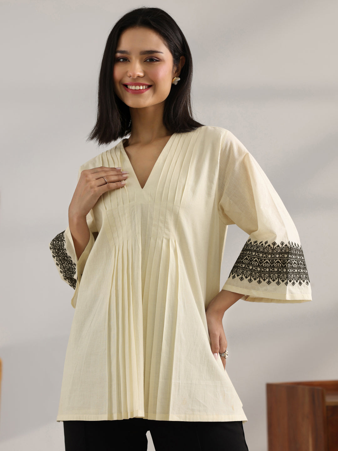 Off White Solid Cotton Straight Short Kurti