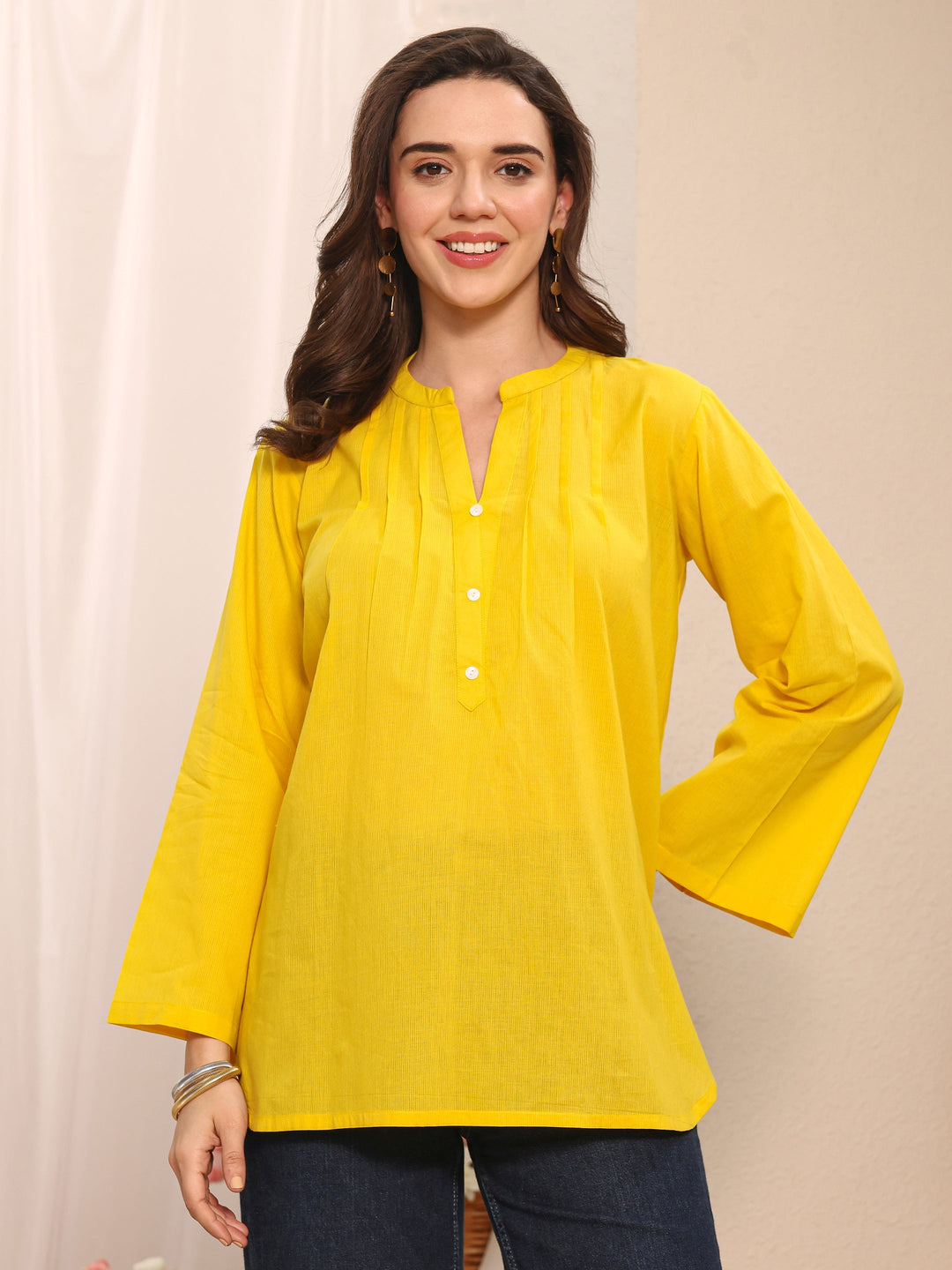 Yellow Solid Solid Cotton Straight Short Kurti
