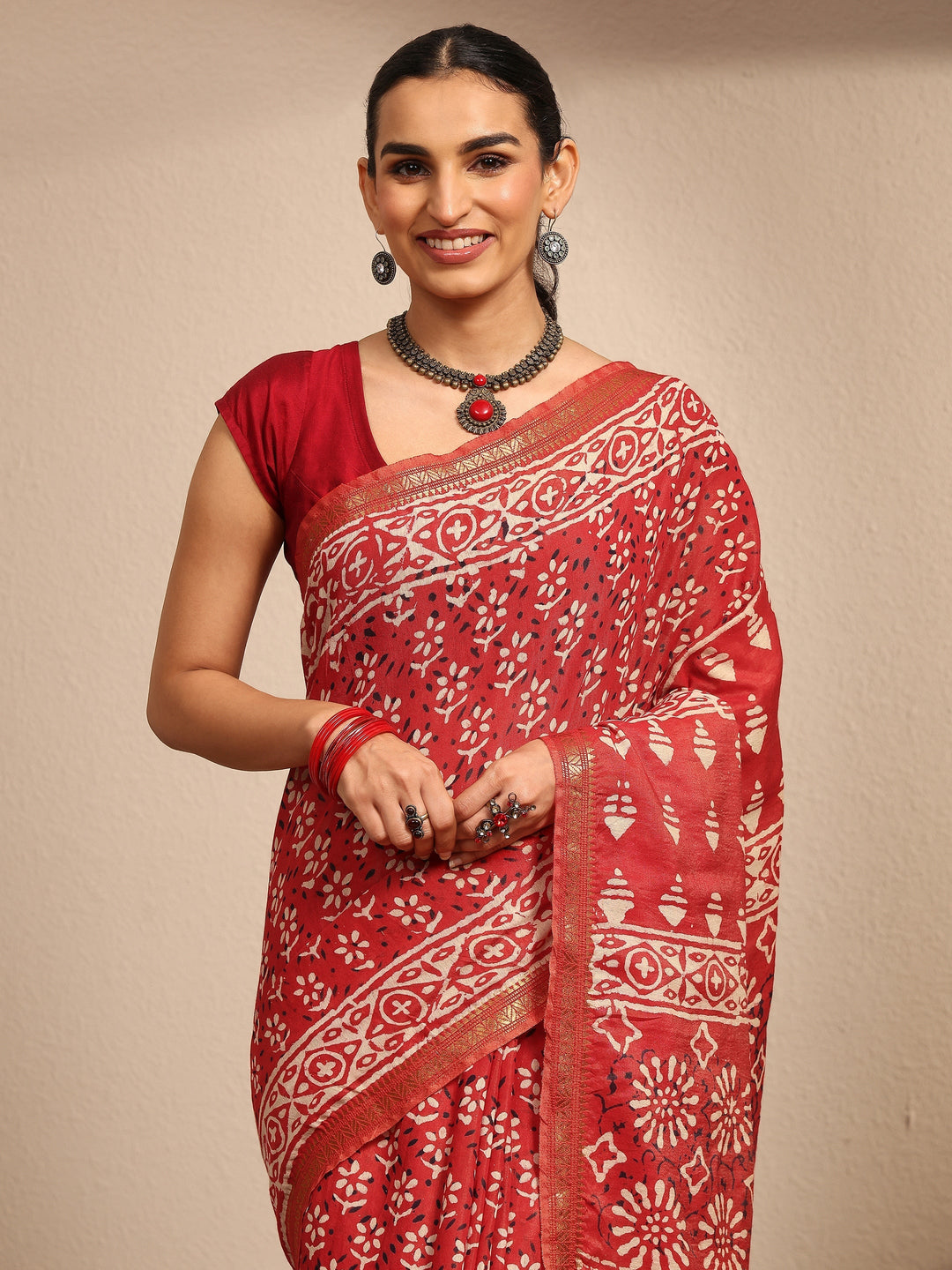 Red Ikat Printed Cotton Saree With Unstitched Blouse Piece