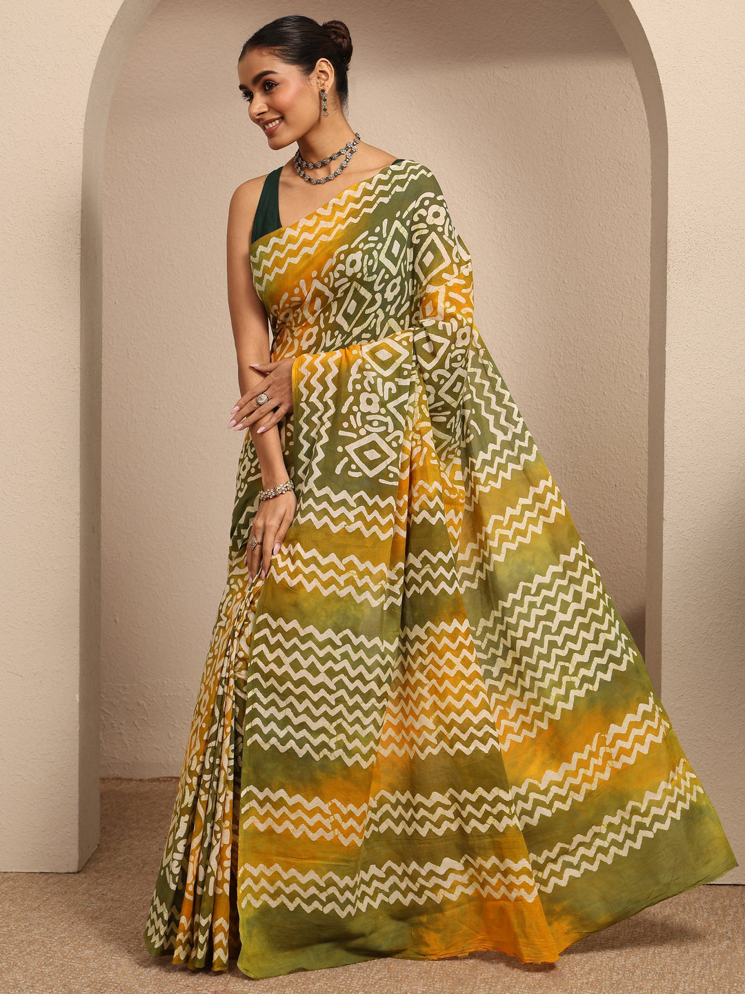 Mustard Ikat Printed Cotton Saree With Unstitched Blouse Piece