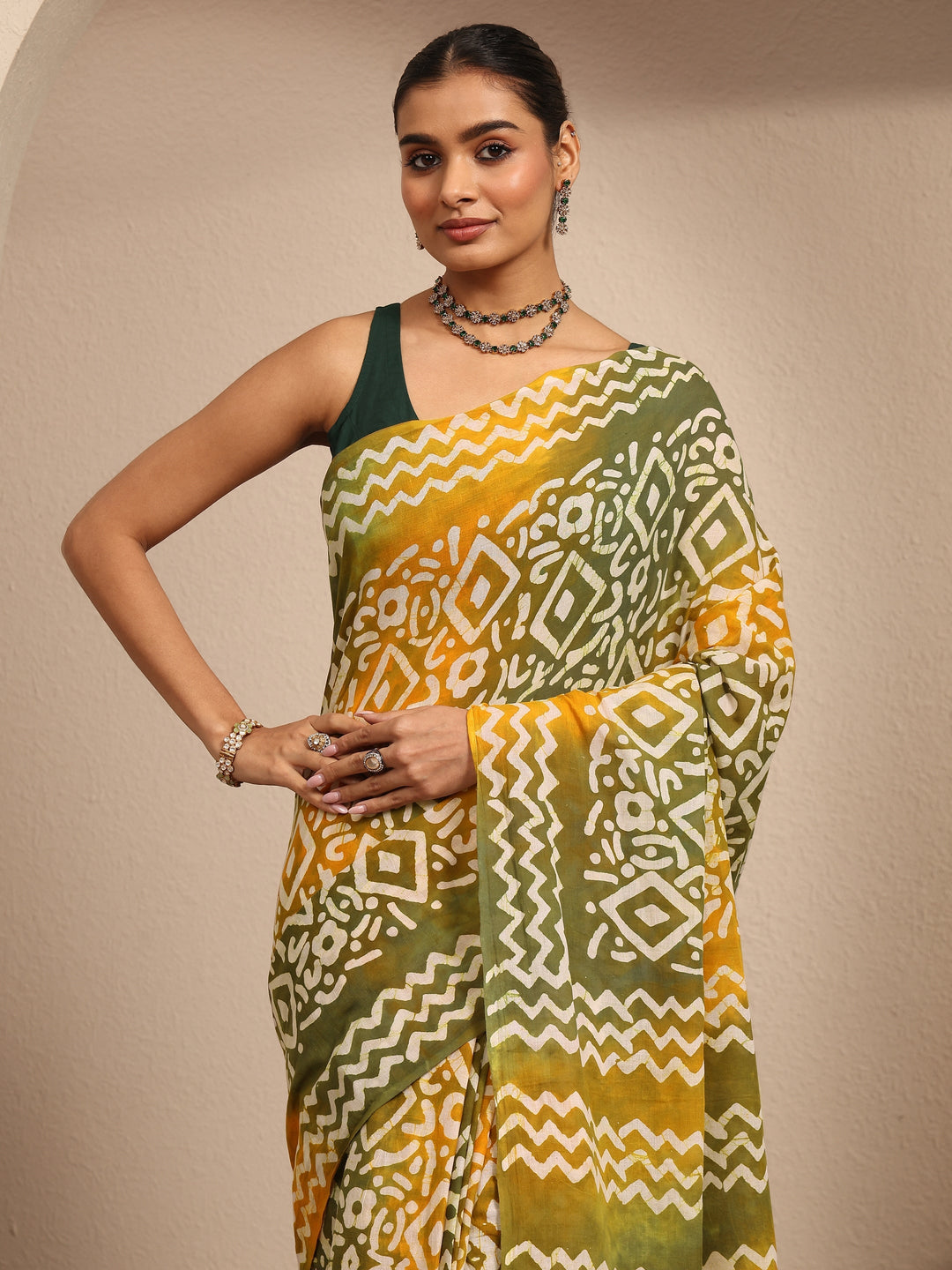 Mustard Ikat Printed Cotton Saree With Unstitched Blouse Piece