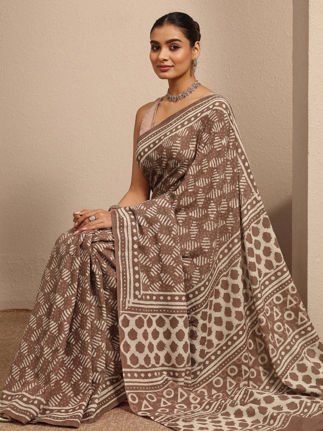 Brown Ikat Printed Cotton Saree With Unstitched Blouse Piece
