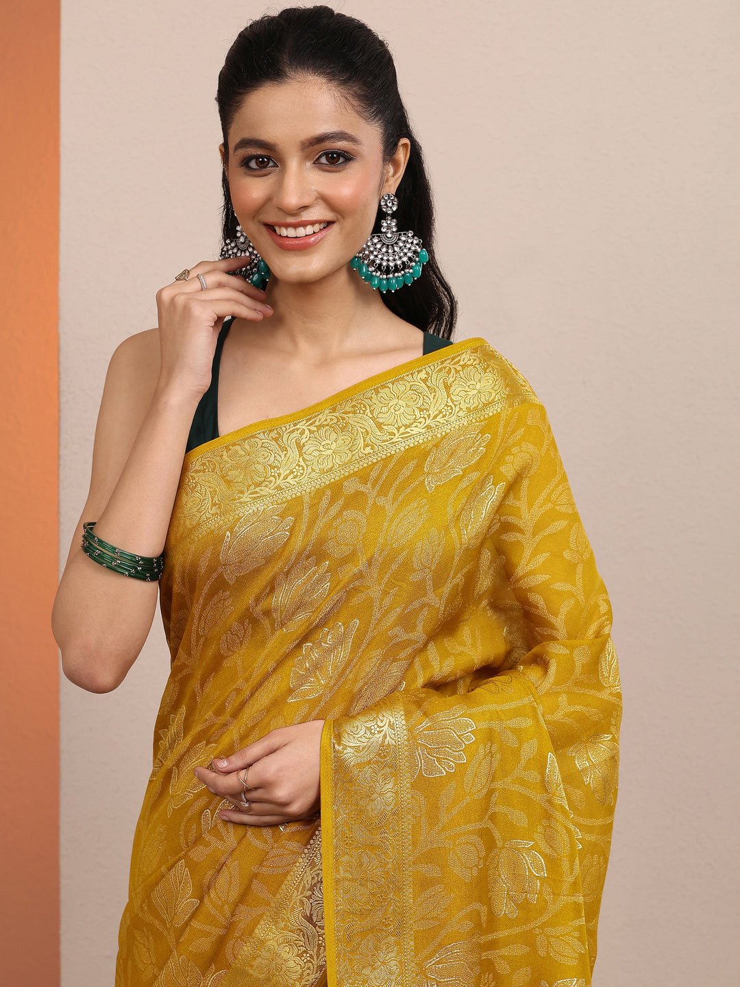 Mustard Woven Design Banarsi Silk Blend Saree With Unstitched Blouse Piece