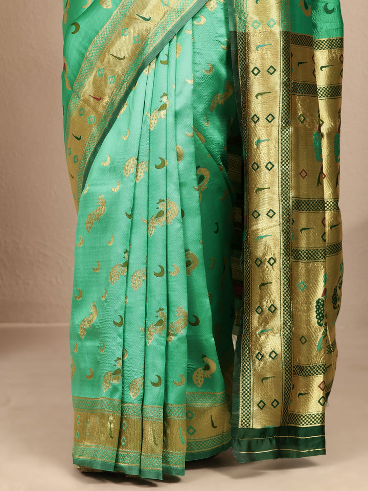 Green Woven Design Silk Blend Banarasi Saree With Unstitched Blouse Piece