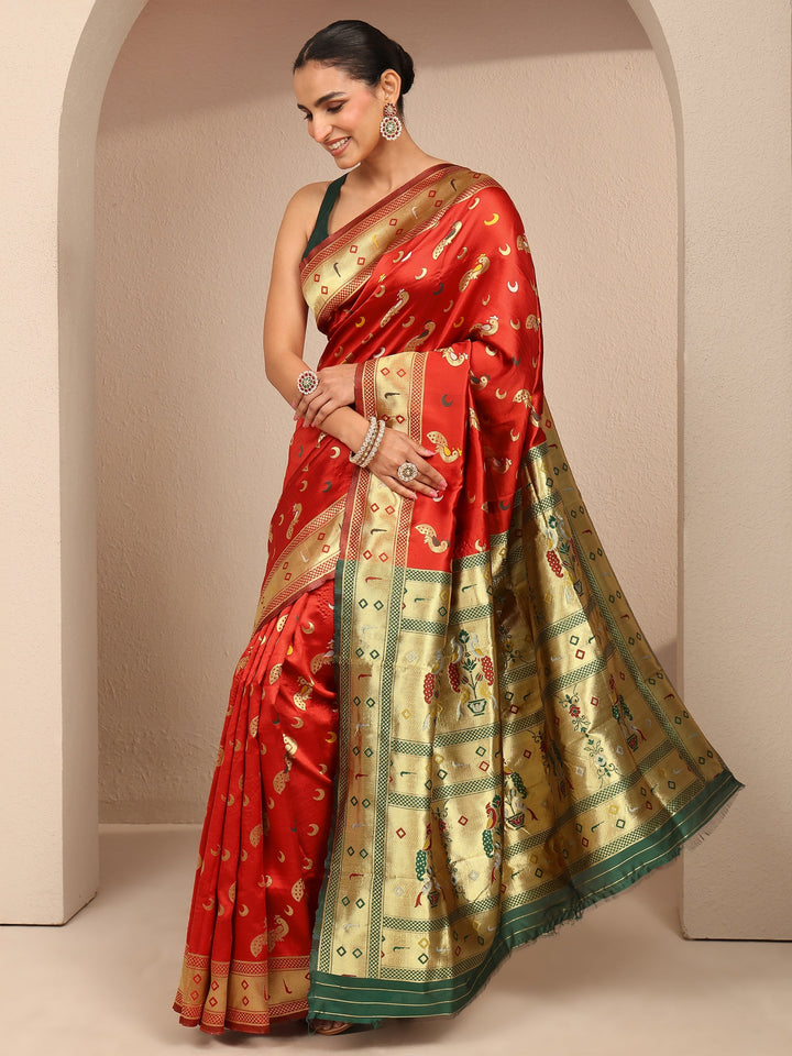 Orange Woven Design Silk Blend Banarasi Saree With Unstitched Blouse Piece