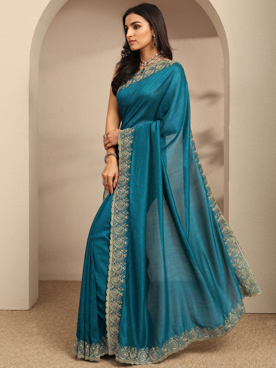 Teal Embellished Silk Blend Saree With Unstitched Blouse Piece