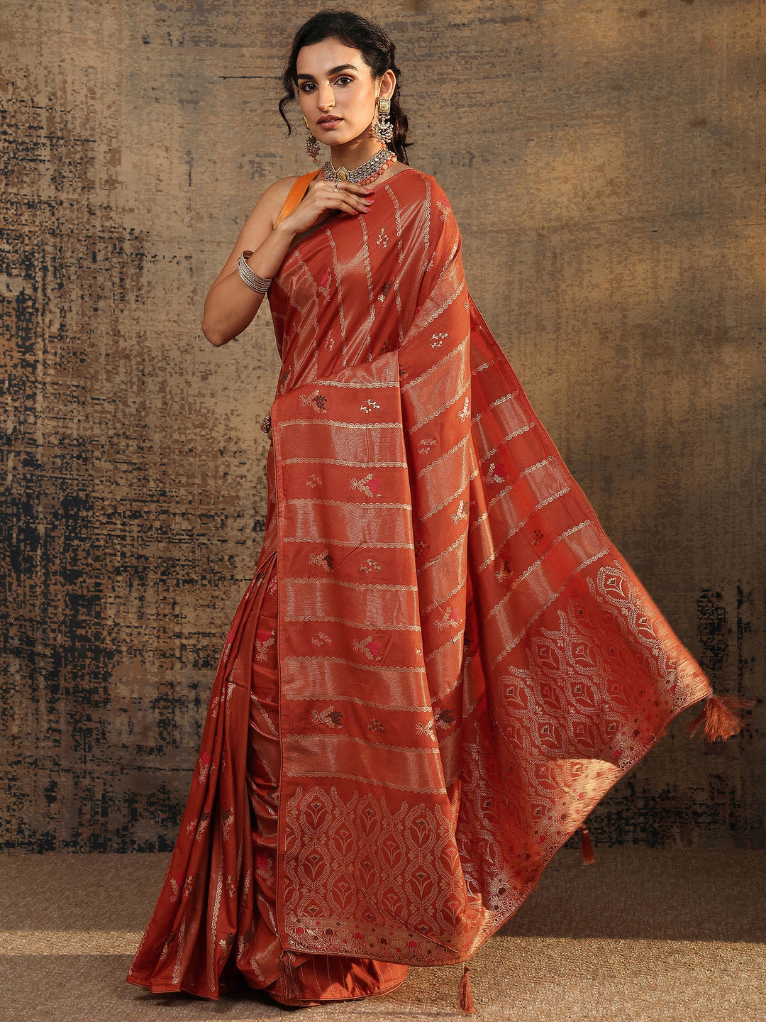 Rust Woven Design Silk Blend Saree With Unstitched Blouse Piece