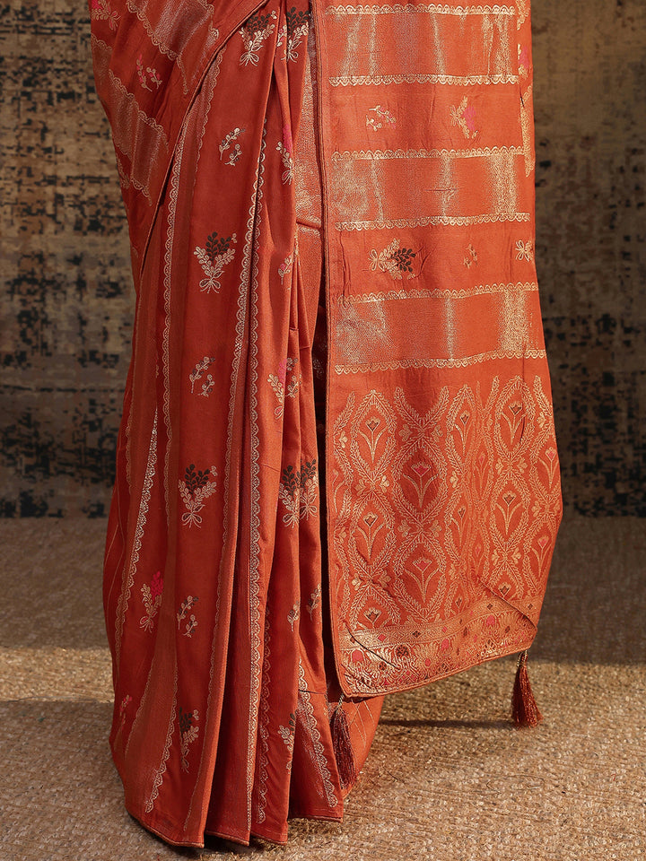 Rust Woven Design Silk Blend Saree With Unstitched Blouse Piece