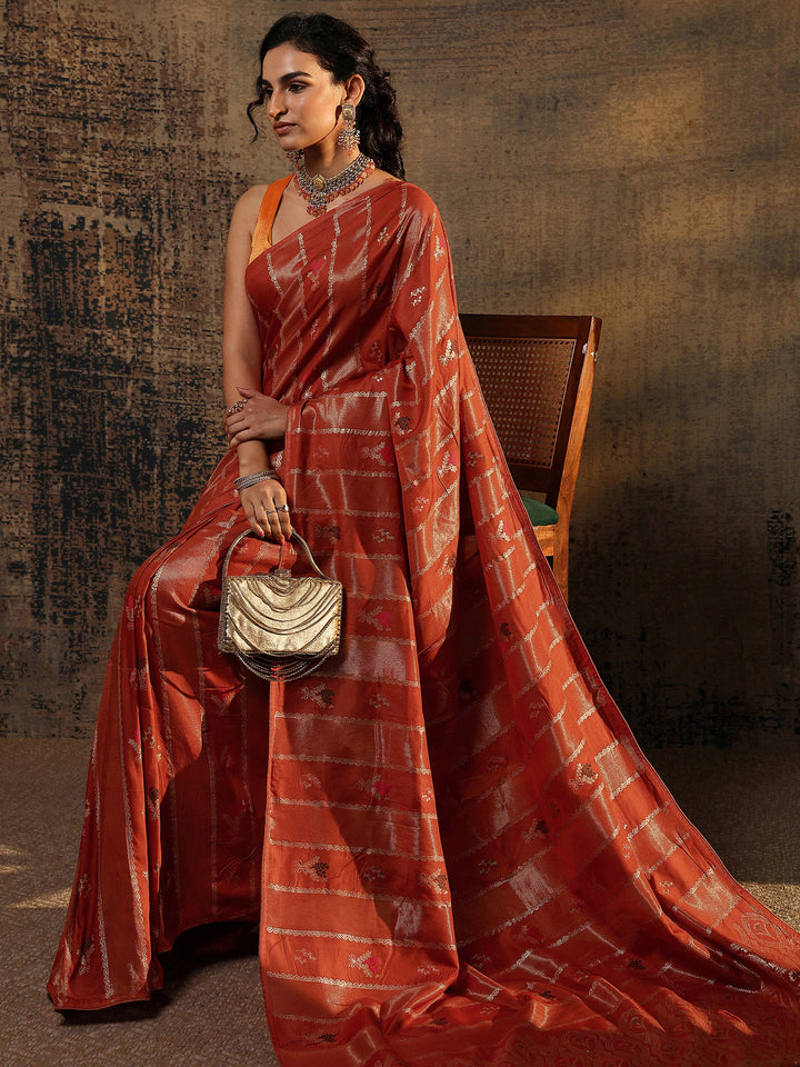 Rust Woven Design Silk Blend Saree With Unstitched Blouse Piece