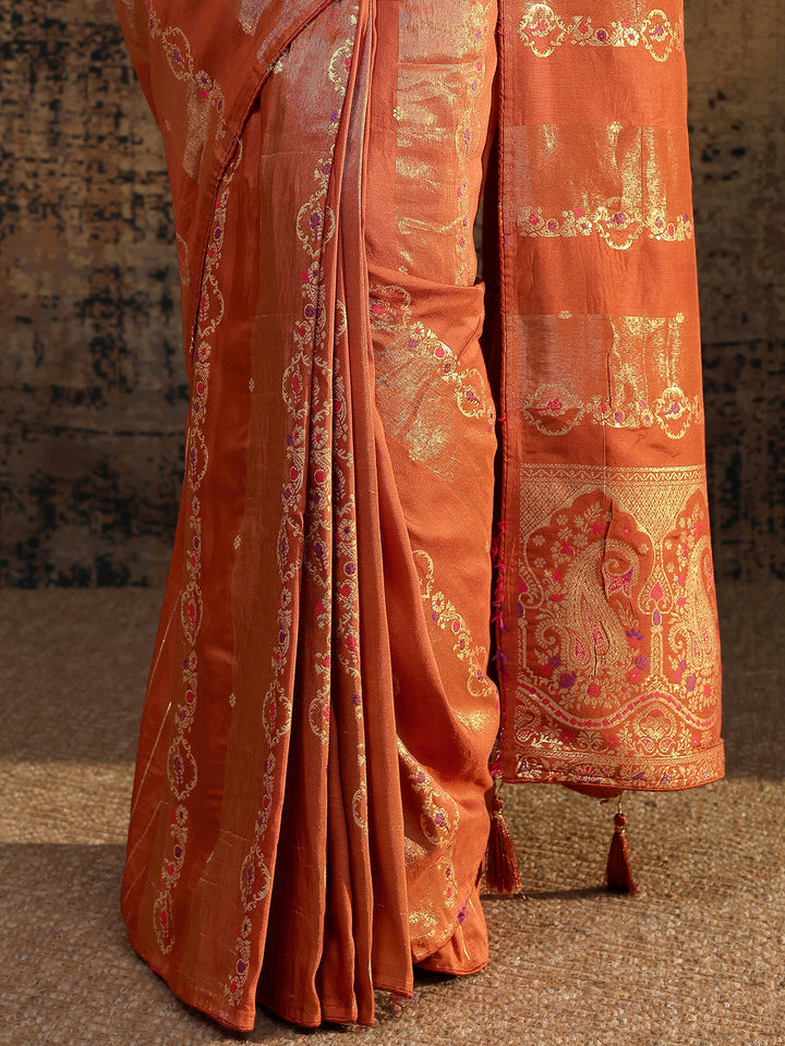 Rust Woven Design Silk Blend Saree With Unstitched Blouse Piece