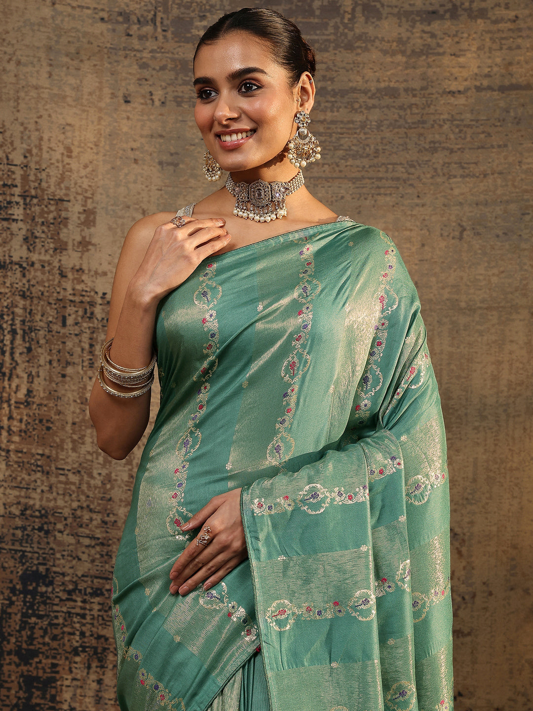 Sea Green Woven Design Silk Blend Saree With Unstitched Blouse Piece