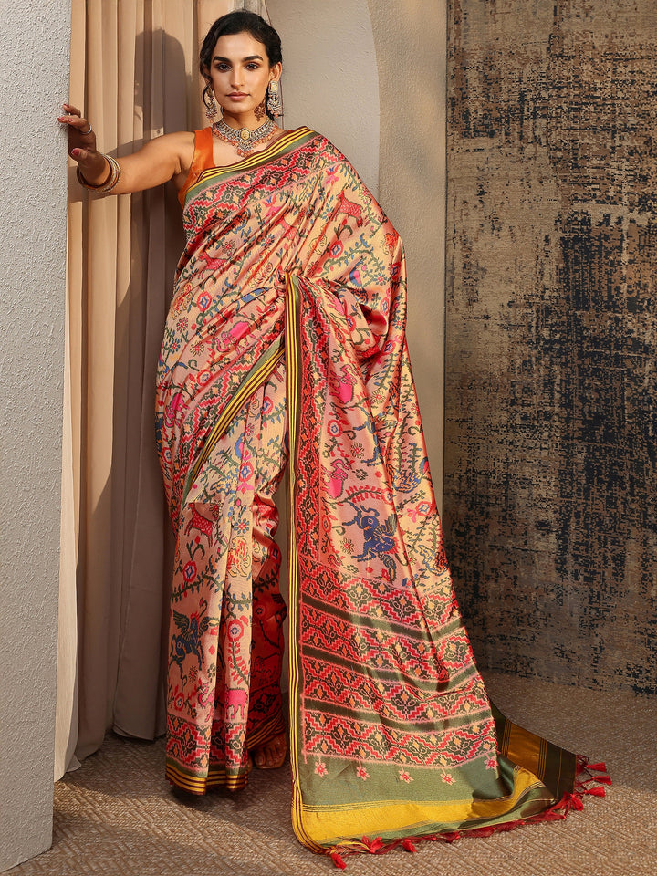Peach Ikat Printed Silk Saree With Unstitched Blouse Piece
