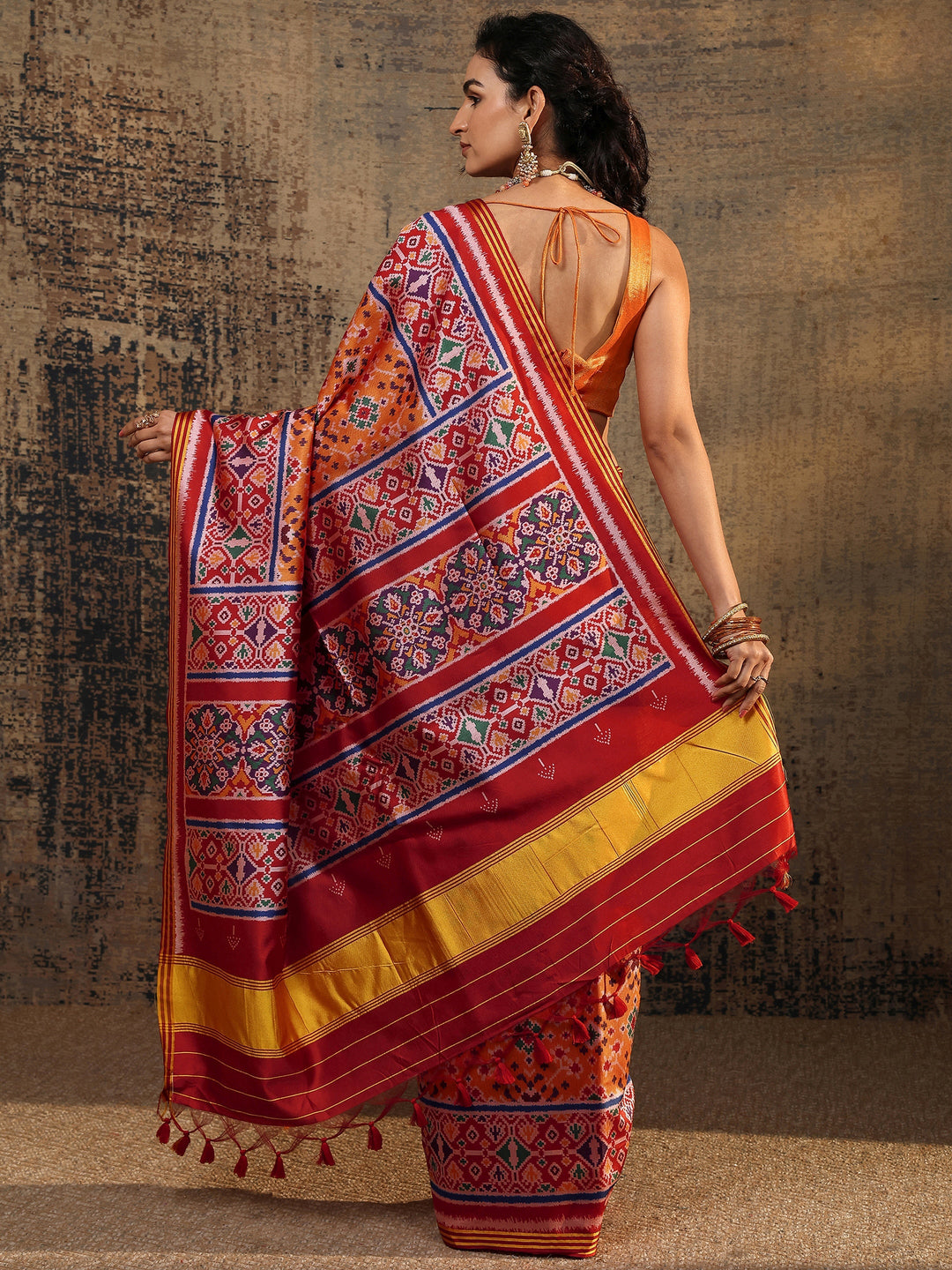 Orange Ikat Printed Silk Saree With Unstitched Blouse Piece