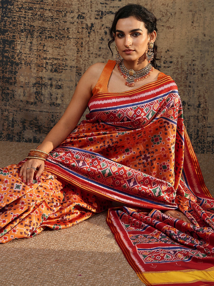 Orange Ikat Printed Silk Saree With Unstitched Blouse Piece