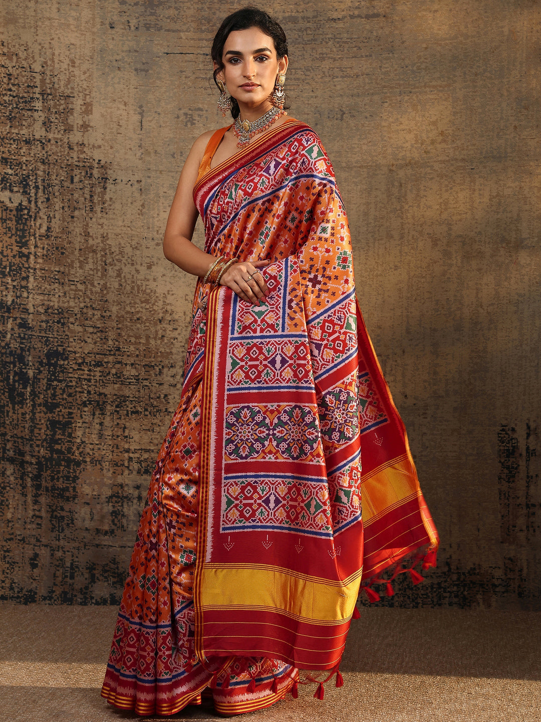 Orange Ikat Printed Silk Saree With Unstitched Blouse Piece