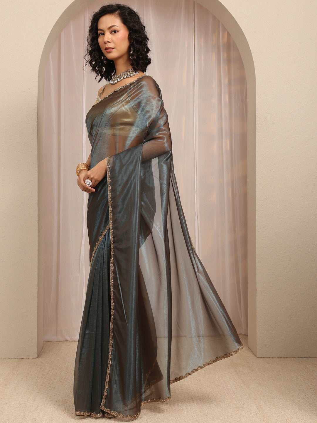 Green Woven Design Net Saree With Unstitched Blouse Piece