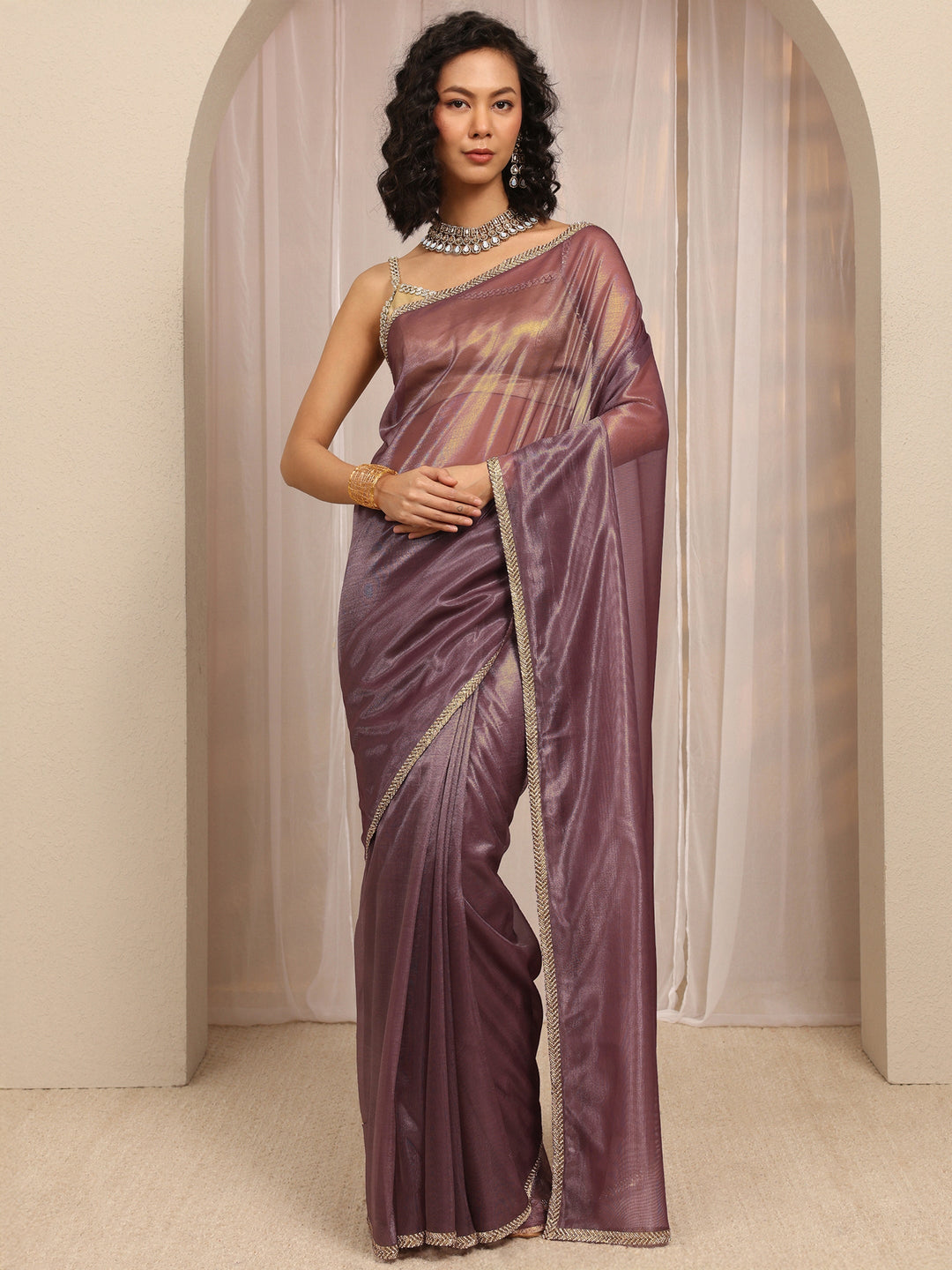 Purple Woven Design Net Saree With Unstitched Blouse Piece