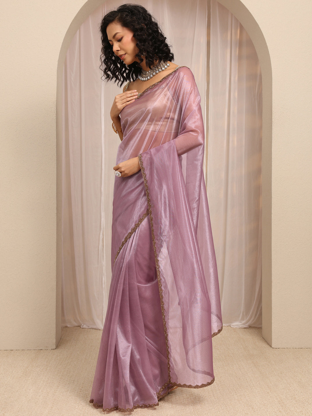 Lavender Woven Design Net Saree With Unstitched Blouse Piece