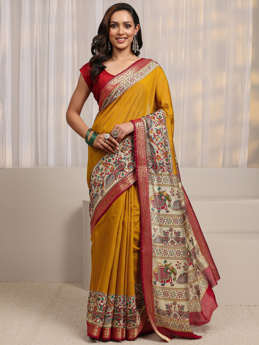 Mustard Ethnic Motif Printed Silk Blend Saree 
With Unstitched Blouse Piece