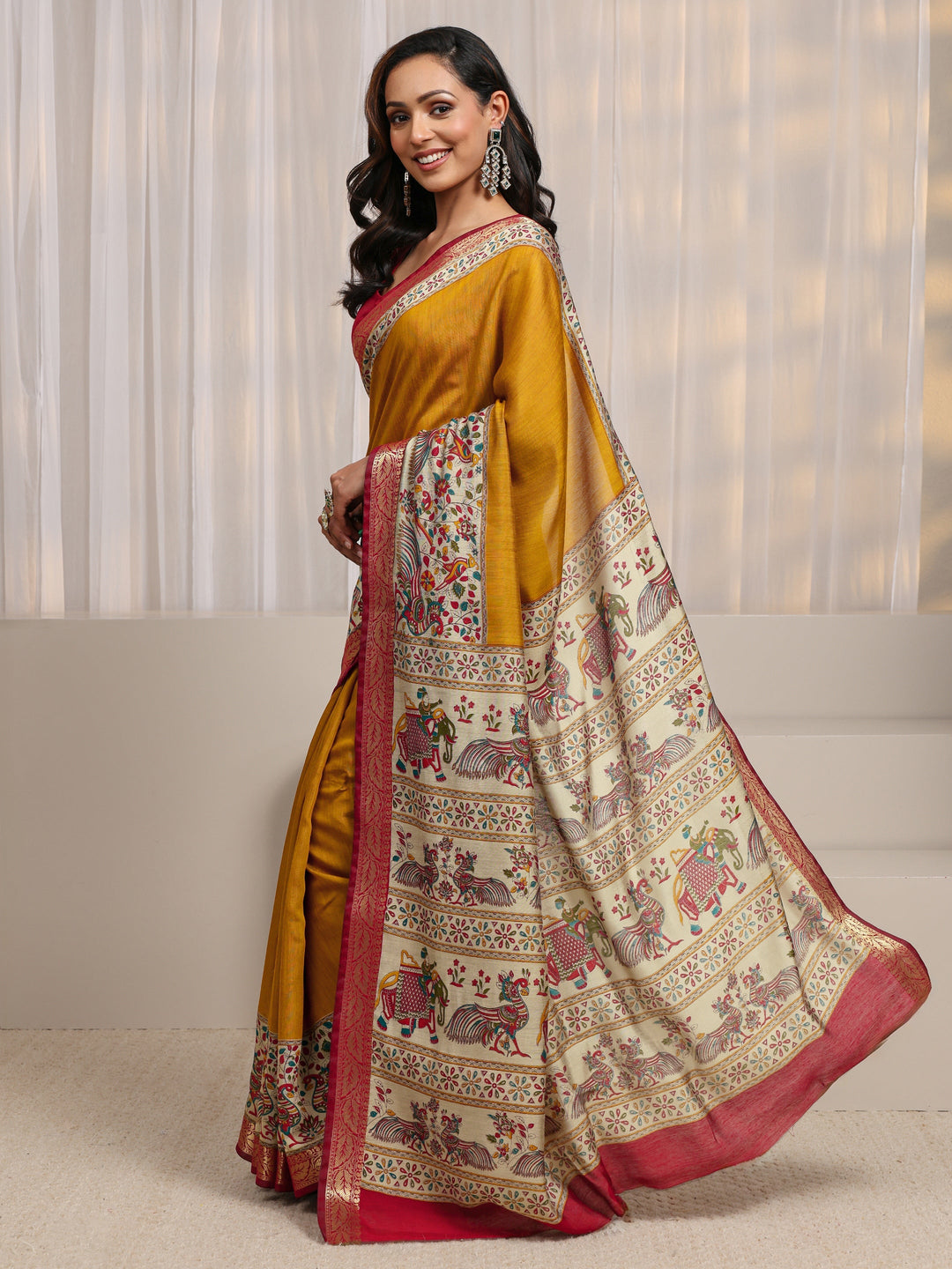 Mustard Ethnic Motif Printed Silk Blend Saree 
With Unstitched Blouse Piece