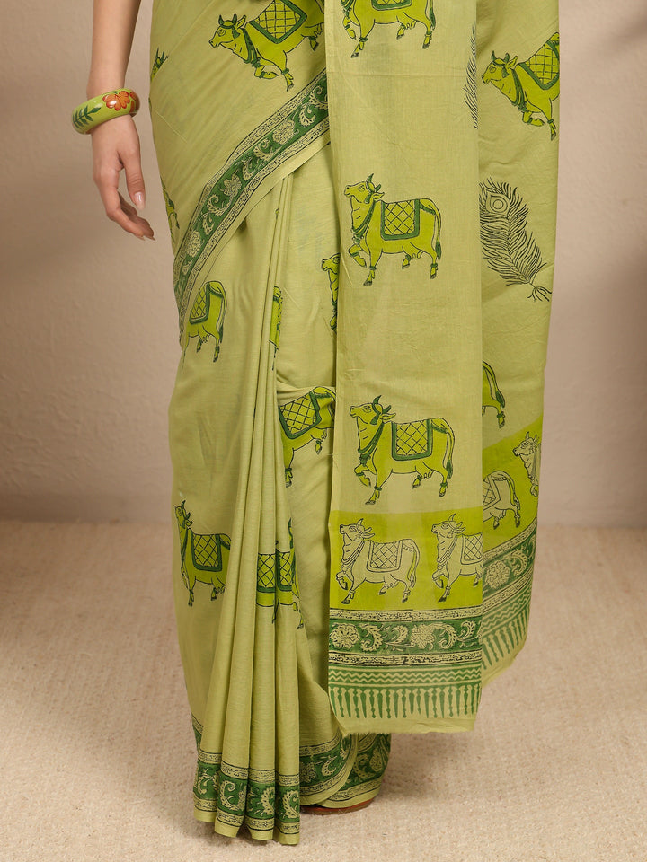 Green Ethnic Motifs Printed Cotton Blend Saree With Unstitched Blouse Piece