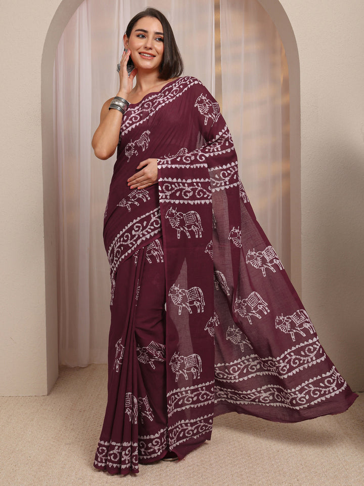 Maroon Printed Cotton Saree 
With Unstitched Blouse Piece