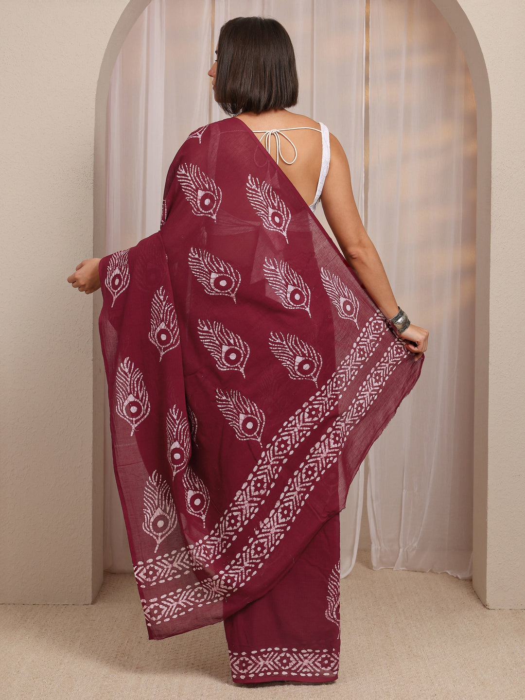 Maroon Printed Cotton Saree 
With Unstitched Blouse Piece